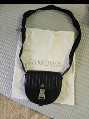 RIMOWA Black Quilted Saddle Crossbody with Silver Hardware